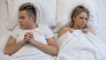 Shocked couple thinking over first intimate experience, lack of sex education