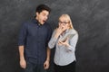 Shocked couple using digital tablet at studio Royalty Free Stock Photo