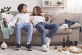 Shocked Couple Waking Up In Messy Room After Celebration Party At Home