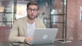 Shocked Young Man Wondering at Work Royalty Free Stock Photo