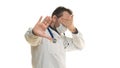 Shocked doctor over white background. Doctor hold a hand over eyes and saying no