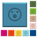 Shocked emoticon engraved icons on edged square buttons