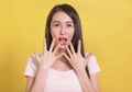 Shocked excited Beautiful Asian woman with mouth open
