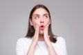 Shocked face of surprised young woman. Funny female shocked face expression. Unbelievable. Portrait of excited woman Royalty Free Stock Photo
