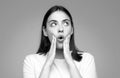 Shocked face of surprised young woman. Funny female shocked face expression. Unbelievable. Portrait of excited woman Royalty Free Stock Photo