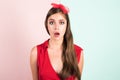 Shocked face of surprised young woman with hair bow. Funny female shocked face expression. Unbelievable. Expressing Royalty Free Stock Photo