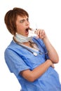 Shocked female doctor holding filled syringe Royalty Free Stock Photo