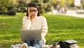 Shocked Freelancer Working On Laptop In Park