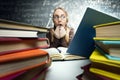 Shocked girl looking in open book Royalty Free Stock Photo