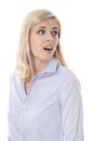 Shocked isolated young business woman looking surprised sideways