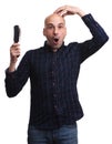 Shocked man holds his head without hair Royalty Free Stock Photo