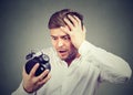 Shocked man scared with time running Royalty Free Stock Photo