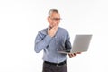 Shocked man using laptop computer and posing isolated Royalty Free Stock Photo