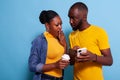 Shocked man and woman reading unexpected news on smartphone Royalty Free Stock Photo