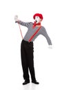 shocked mime looking at red suspenders