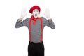 shocked mime standing with hands up