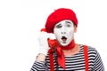 shocked mime talking by stationary telephone