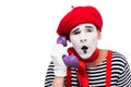 shocked mime talking by ultra violet retro stationary telephone