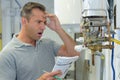 shocked plumber checking issue Royalty Free Stock Photo