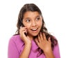 Shocked Pretty Hispanic Girl On Cell Phone Royalty Free Stock Photo