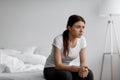 Shocked sad european young woman suffering from mental problems, stress and loneliness, feeling depressed Royalty Free Stock Photo