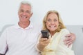 Shocked senior couple watching television Royalty Free Stock Photo