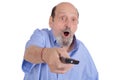 Shocked senior man watching tv with remote control Royalty Free Stock Photo