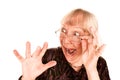 Shocked senior woman looking over the top of her g Royalty Free Stock Photo