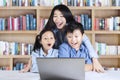 Shocked students and teacher in library Royalty Free Stock Photo