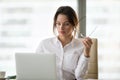 Shocked surprised businesswoman amazed by reading online news on