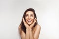 Shocked and surprised girl laughing covering mouth her hands.Beautiful Woman with natural makeup. Royalty Free Stock Photo