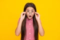 Shocked surprised teenager girl. Portrait of teenager child girl in glasses. Kid at eye sight test. Girl with eyeglasses Royalty Free Stock Photo