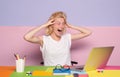 The shocked teacher use notebook in the classroom on color background. Teaching and people learning concept. Deadline Royalty Free Stock Photo