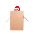 Shocked woman in christmas hat sitting out of big gift box and peeking over edge of blank empty box. isolated on white background Royalty Free Stock Photo