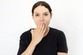 Shocked woman covering her mouth with hand Royalty Free Stock Photo