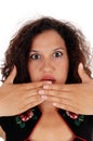 Shocked woman with hand over mouth. Royalty Free Stock Photo