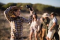 Shocked woman holding binoculars during safari vacation Royalty Free Stock Photo