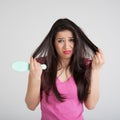 Shocked woman losing hair on hairbrush Royalty Free Stock Photo