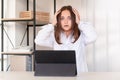 Shocked woman missed videochat online conference