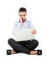 Shocked woman sitting with laptop Royalty Free Stock Photo