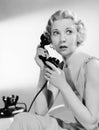 Shocked woman on telephone Royalty Free Stock Photo