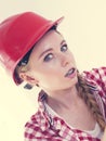 Shocked woman wearing helmet Royalty Free Stock Photo