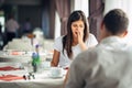 Shocked woman in disbelief handling bad news.Relationship discussion,marriage problems.Woman hearing confession