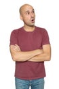 Shocked 40 years old bald man in t-shirt isolated Royalty Free Stock Photo