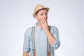 Shocked young man covering his mouth with hands. Royalty Free Stock Photo