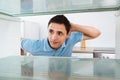 Shocked Man Looking Into Empty Refrigerator Royalty Free Stock Photo