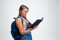 Shocked young woman reading book Royalty Free Stock Photo