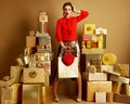 Shocked young woman with shopping bag and red heart Royalty Free Stock Photo