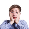 Shocking news. Shocked man expressing amaze on face Royalty Free Stock Photo