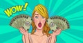 Shocking woman surprised say wow holding money